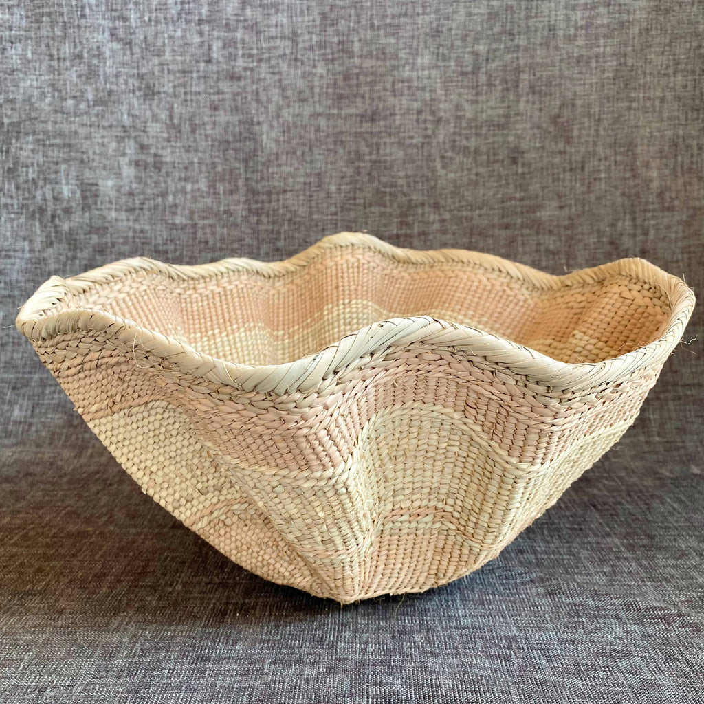 Dramatic Rippled Palm Leaf Dancing Basket