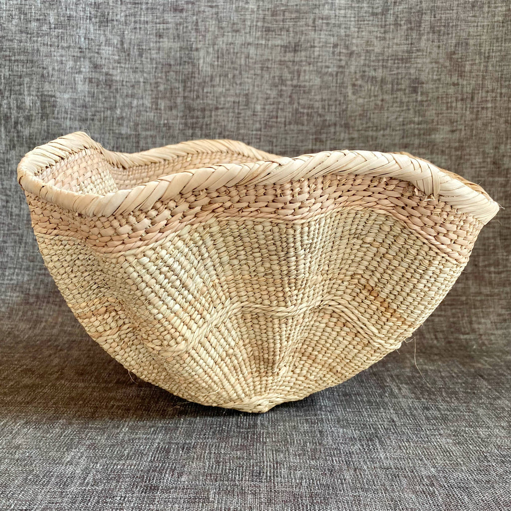 Dramatic Rippled Palm Leaf Dancing Basket