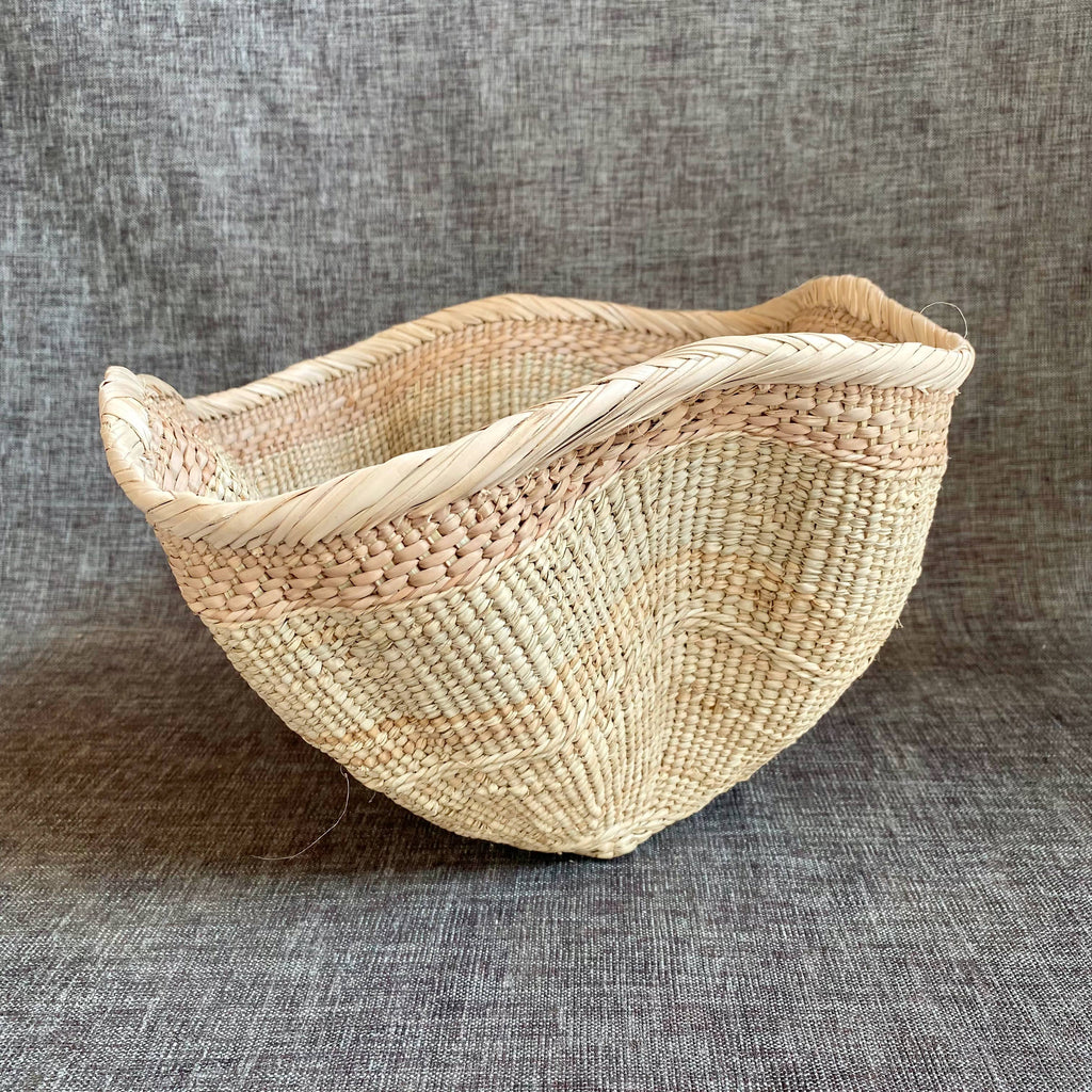 Dramatic Rippled Palm Leaf Dancing Basket