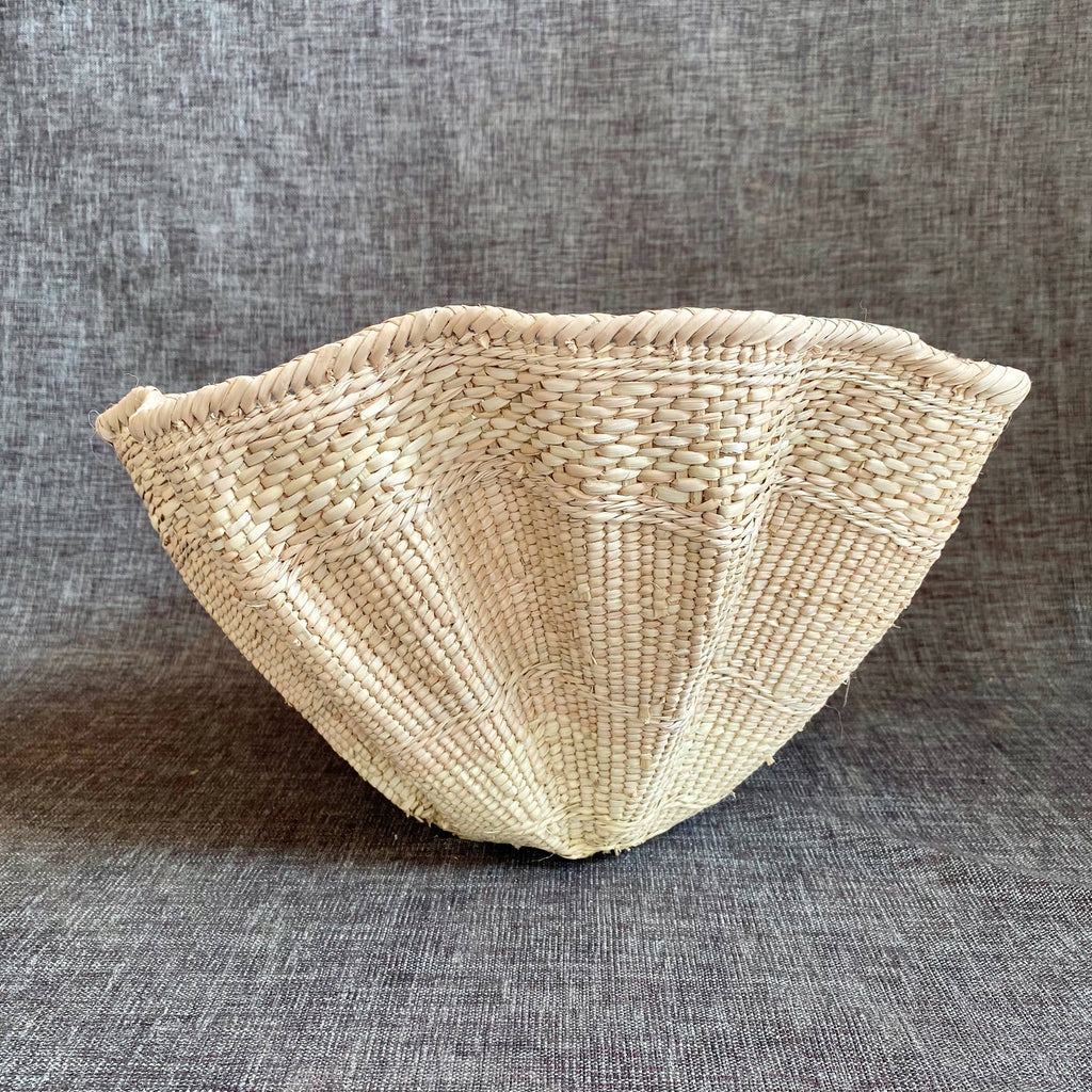 Dramatic Rippled Palm Leaf Dancing Basket