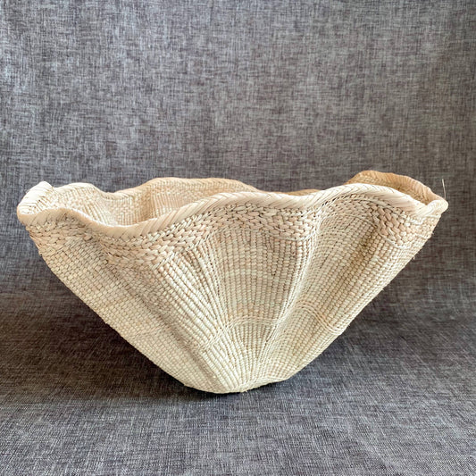 Dramatic Rippled Palm Leaf Dancing Basket