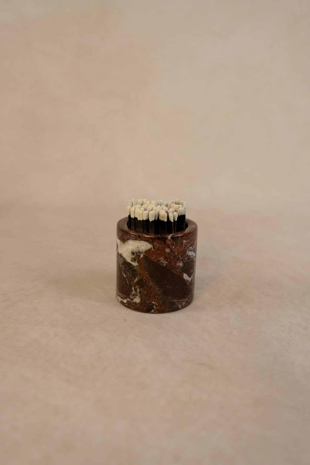 Red Marble Matchstick Holder - Product in use