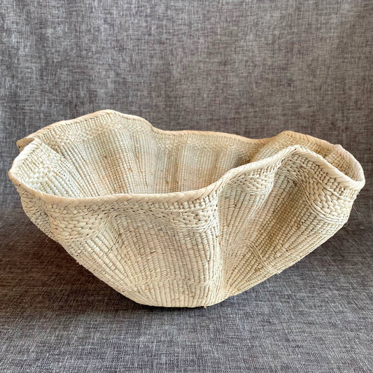 Dramatic Rippled Palm Leaf Dancing Basket